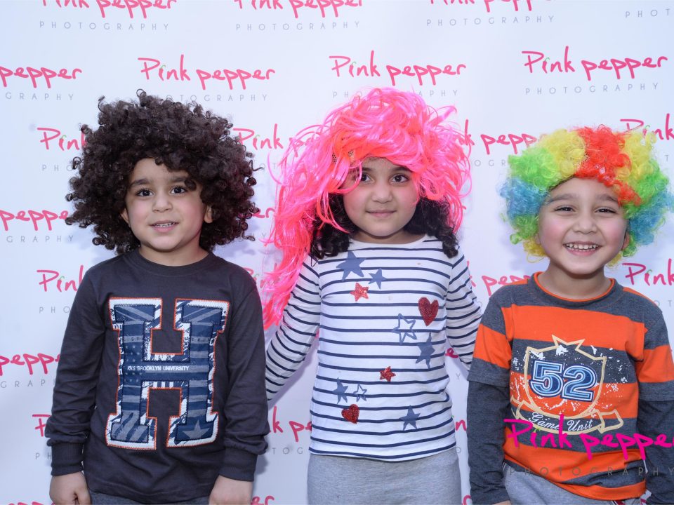 Kids with colored wigs at the best Day care with transport