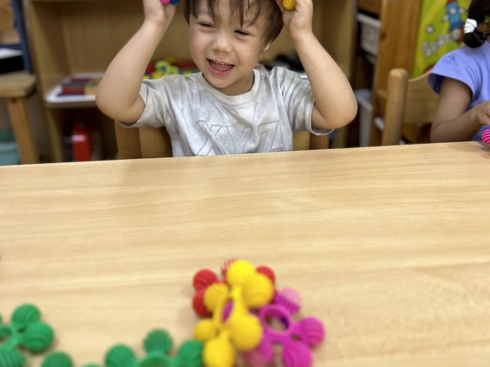 Toddler playing in nursery