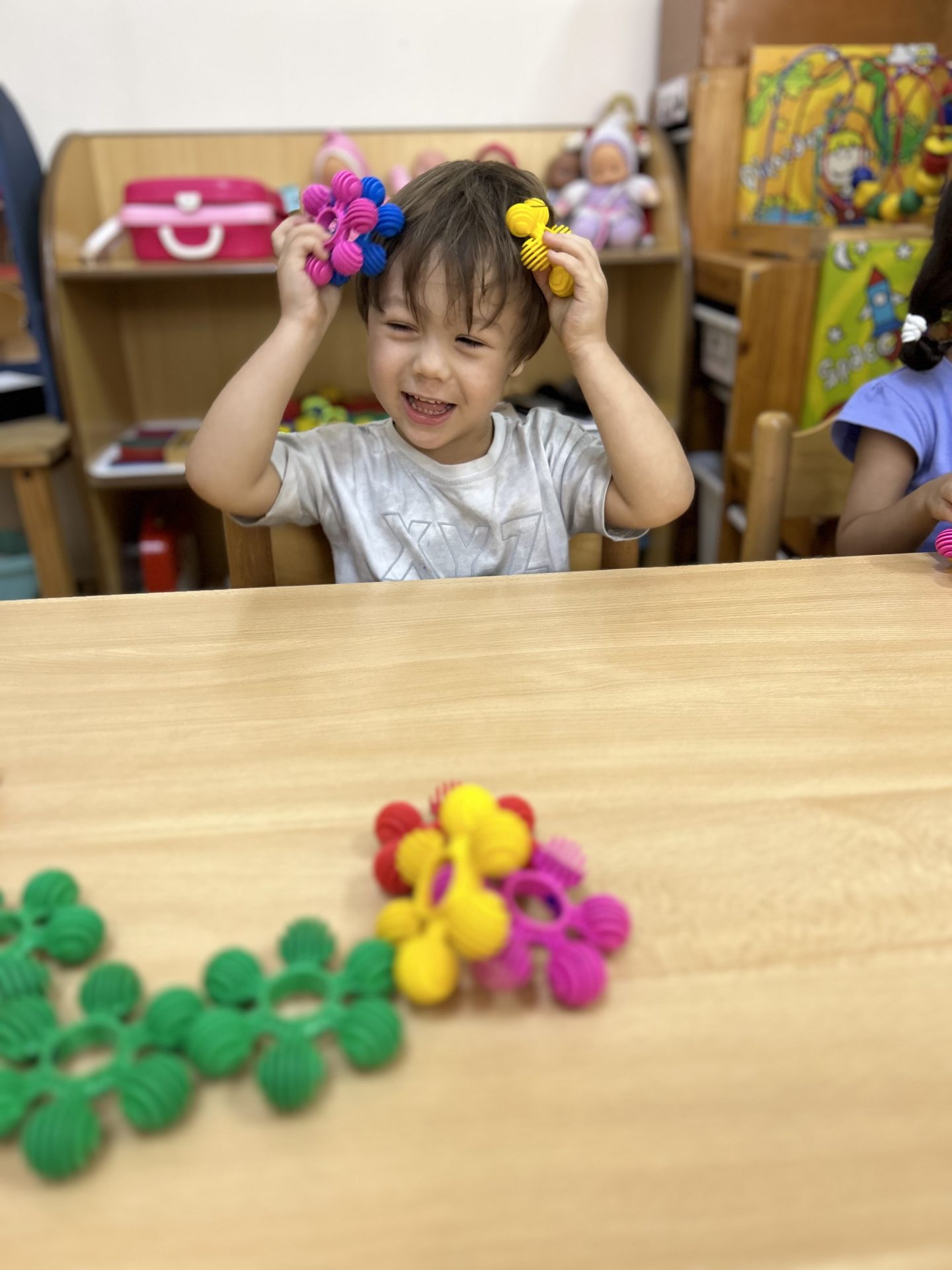 Toddler playing in nursery